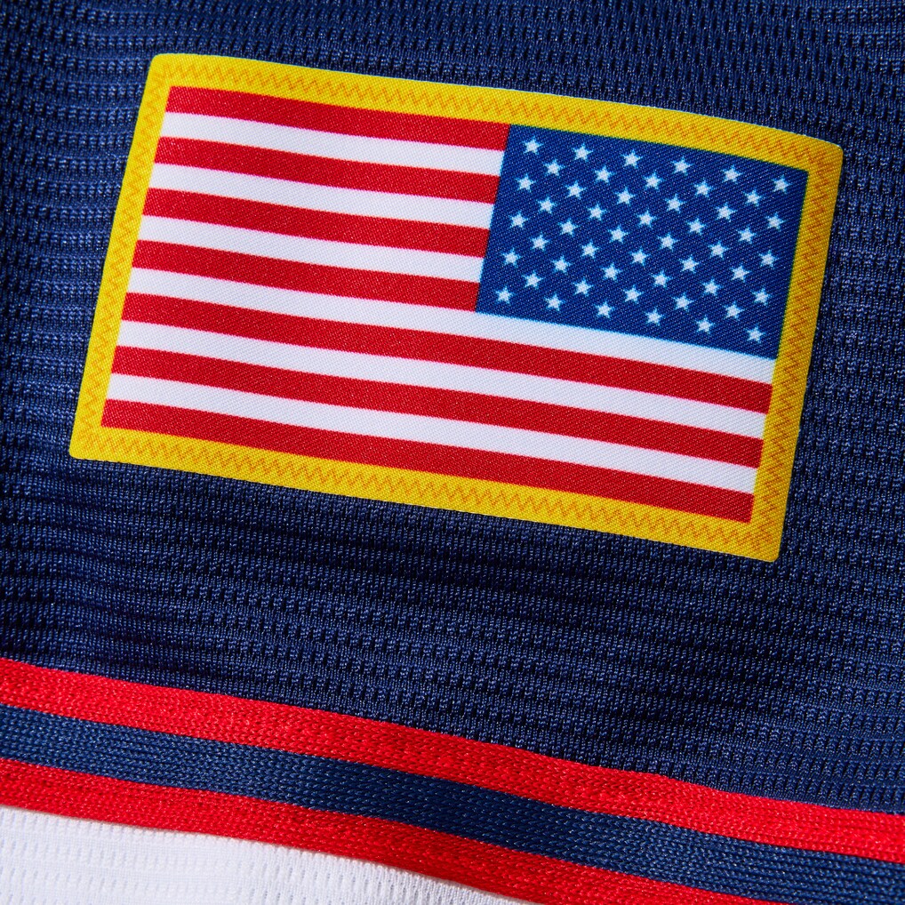 American flag patch on a blue background