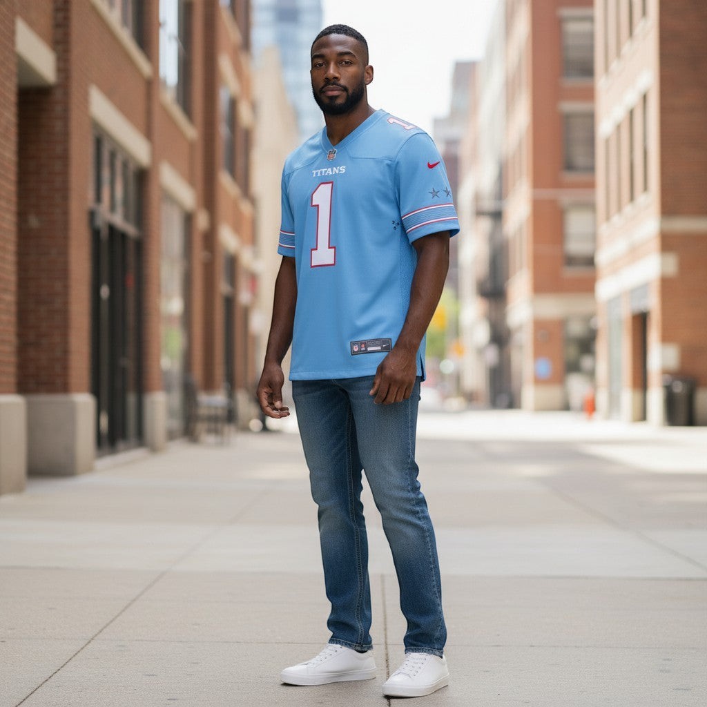 Sports Jersey Direct Cameron Ward Tennessee Titans light blue game jersey with white number 1 and team graphics.